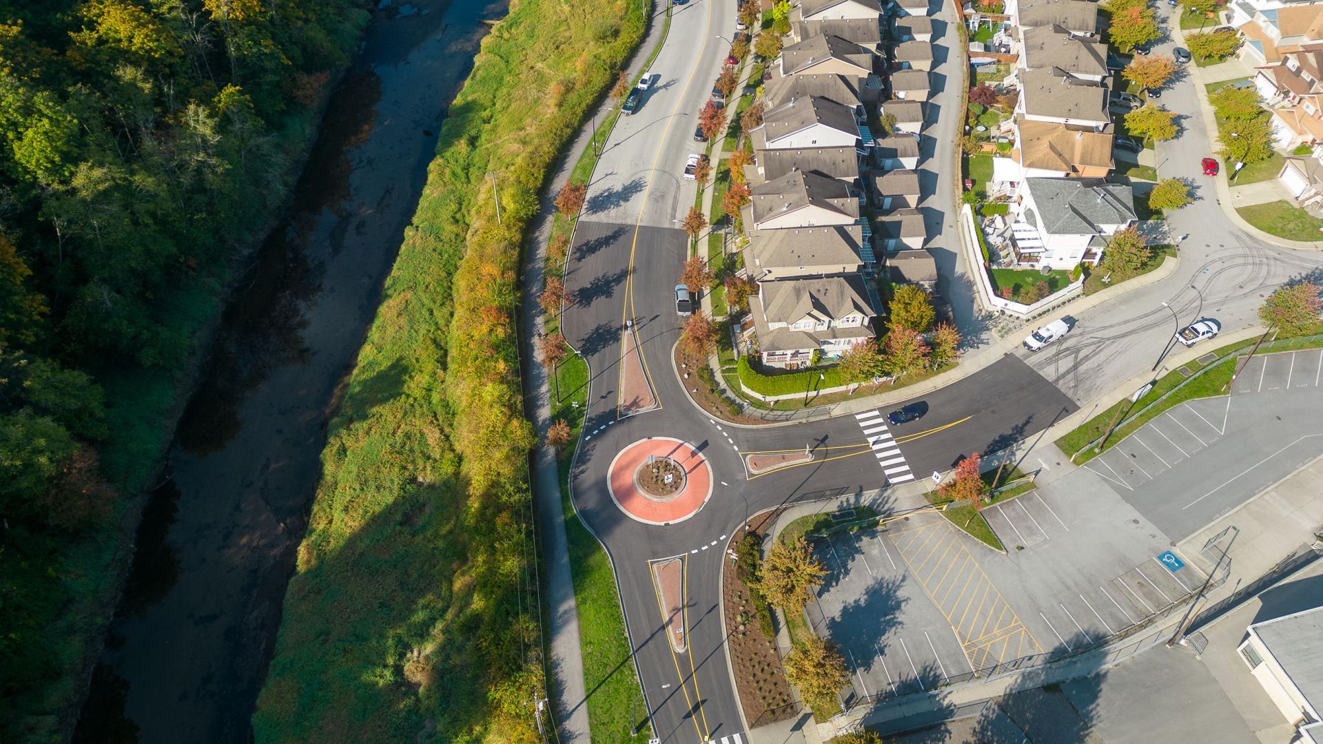 An aerial view of the new single lane roundabout at the intersection of Kanaka Way and 234A Street.