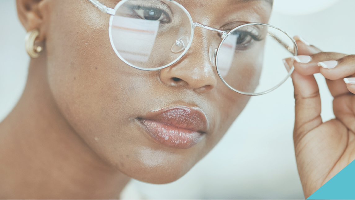 Women with Glasses Looking at a Laptop