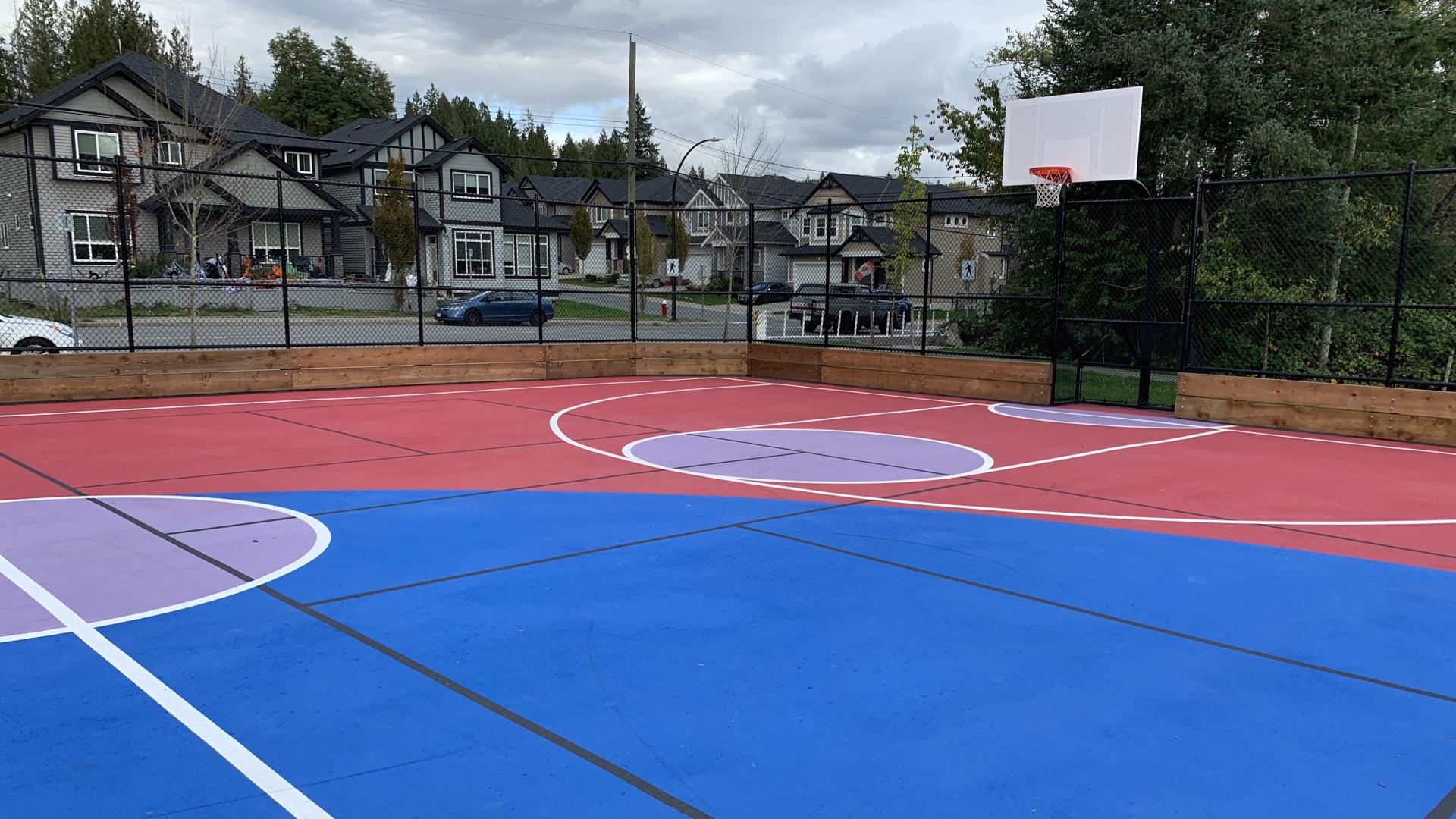 Sports court with basketball hoops
