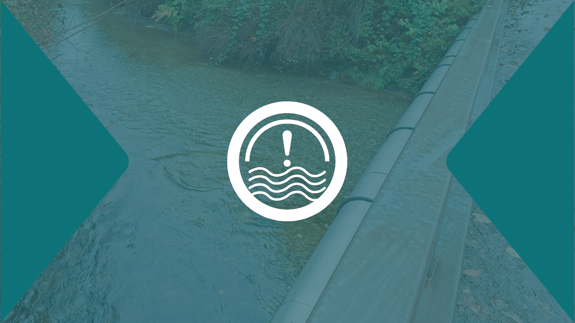 An exclamation point overtop a faded blue swollen river as seen from a bridge.
