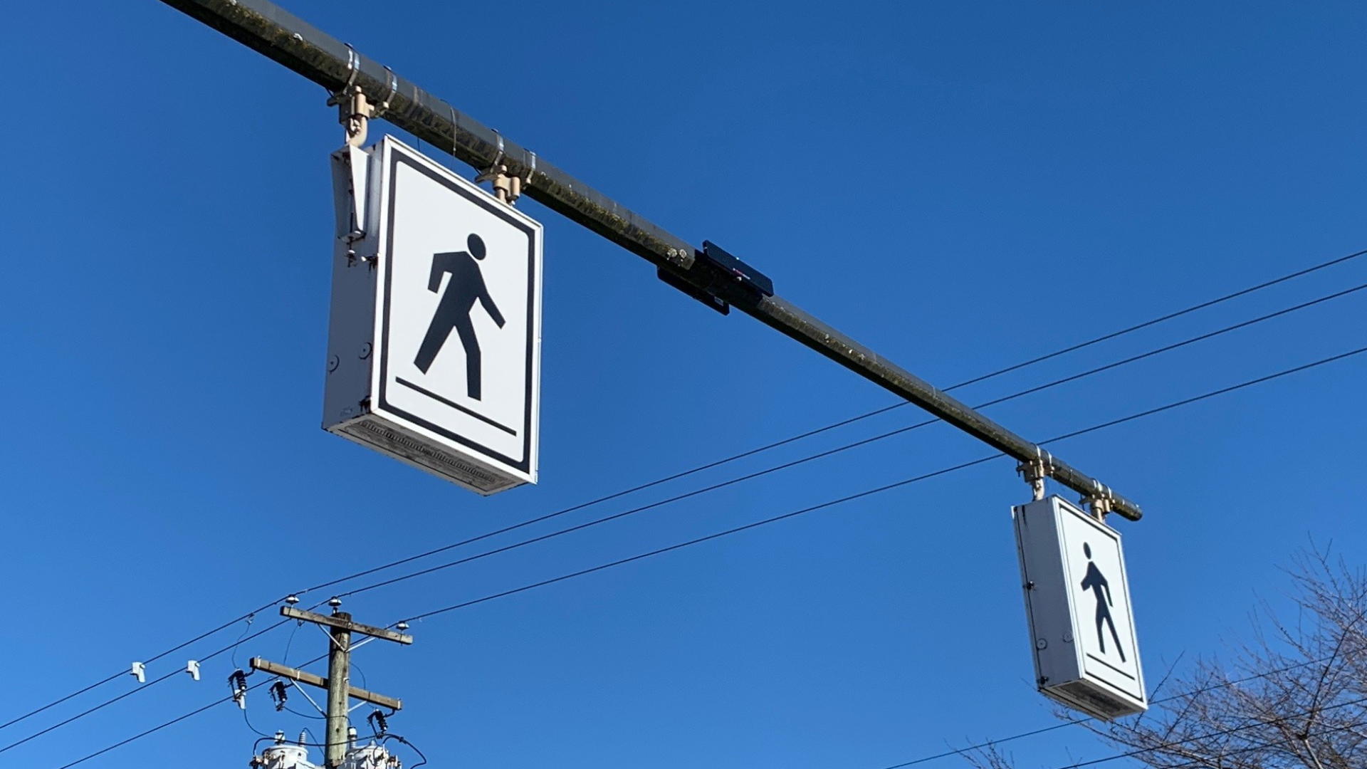 A pedestrian-activated overhead light