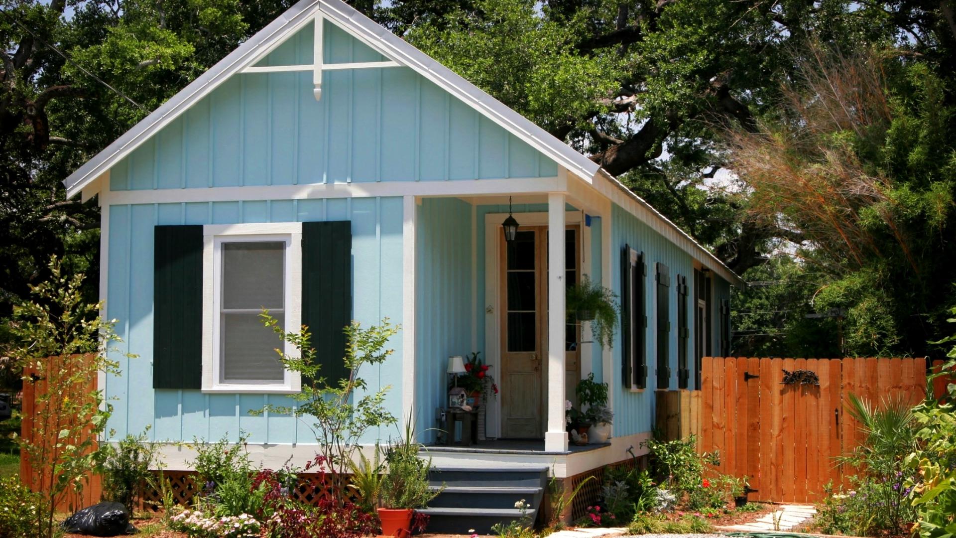 small blue carriage house
