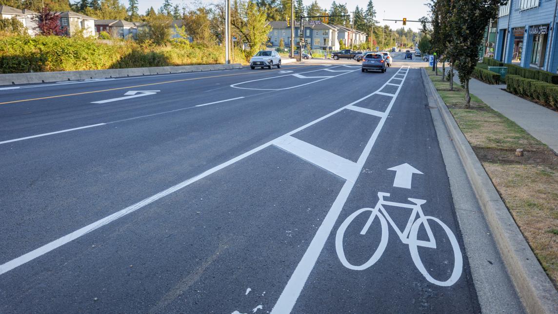 A painted cycling lane next to traffic