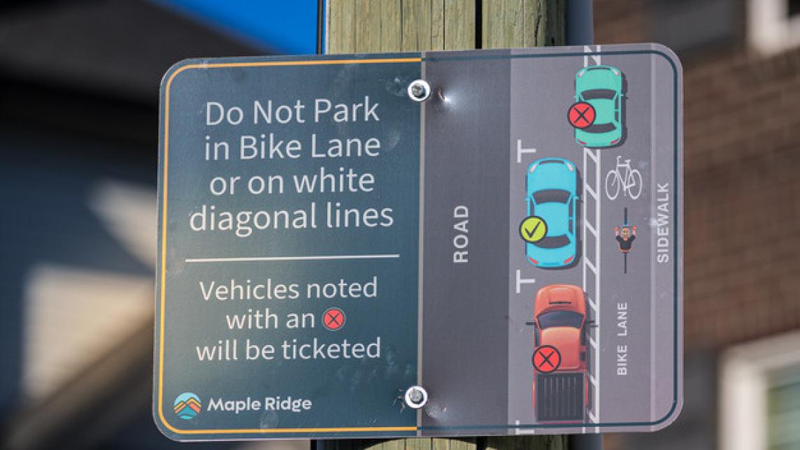 An illustrative parking sign