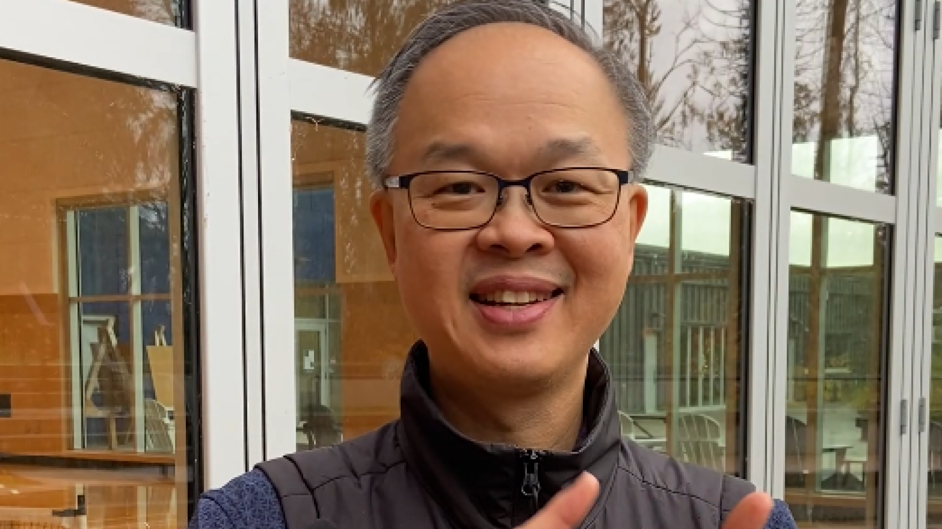 A man counts off reminders on his fingers, stay informed, stay connected.