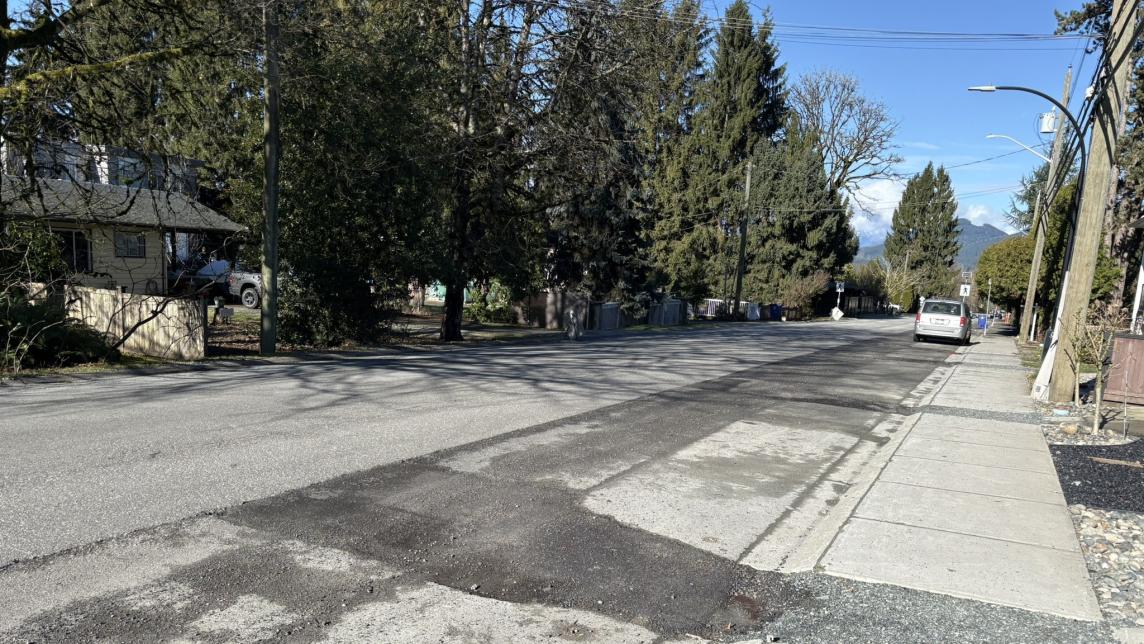 228 Street roadway showing pavement repairs