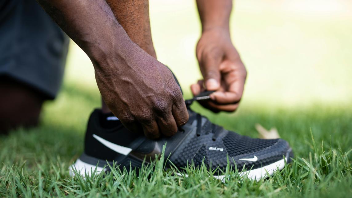 Man Tying His Running Shoes