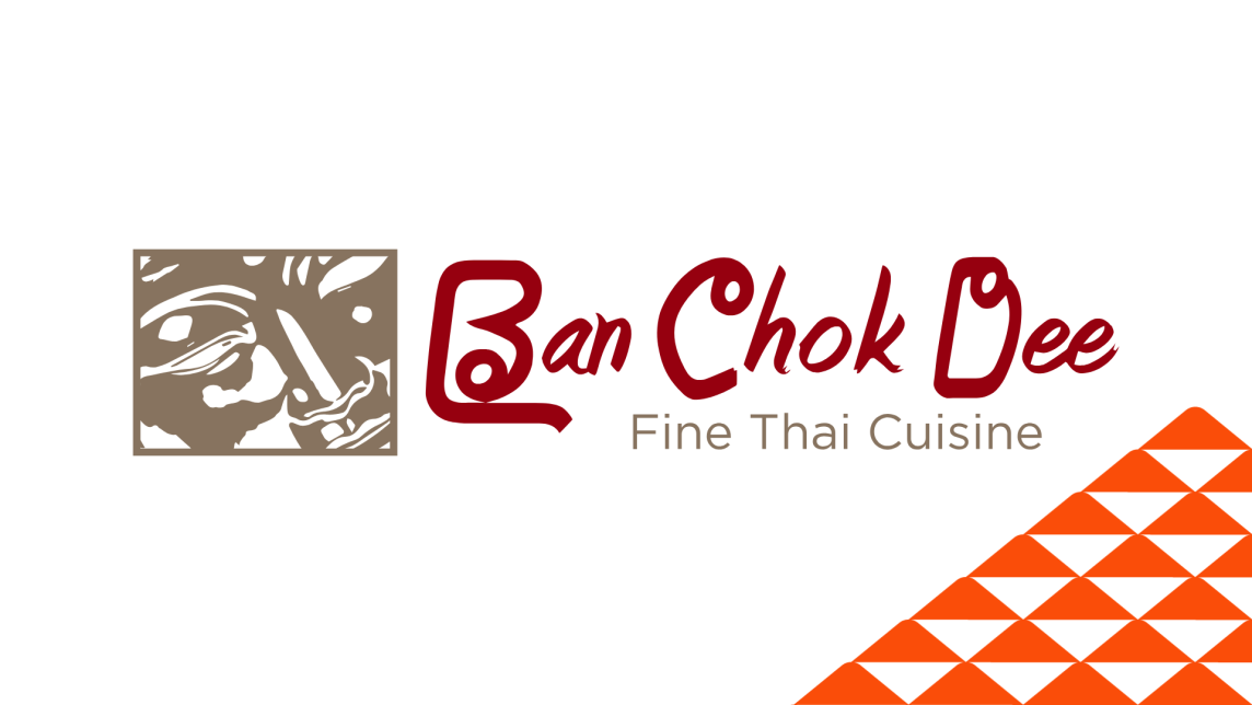 The Ban Chok Dee Fine Thai Cuisine logo next to a soccer-ball-patterned mountain.