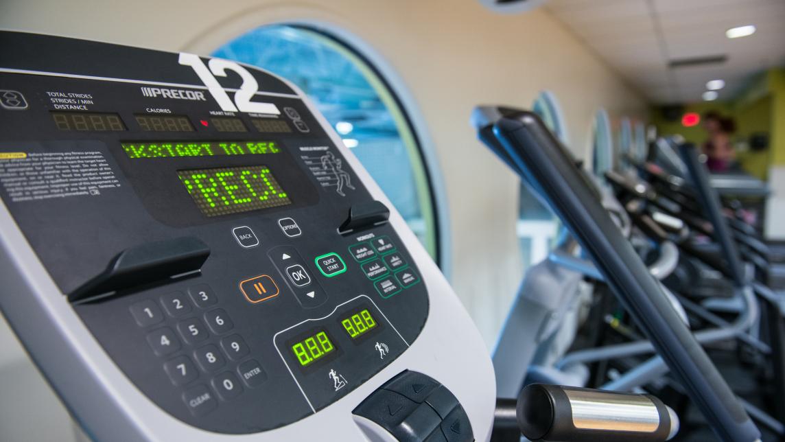 The digital panel of a fitness machine on the Leisure Centre's second floor, overlooking the pool.