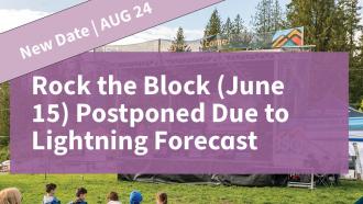 New Date: Aug 24. Rock the Block (June 15) Postponed Due to Lightning Forecast. A group of people sit on a grassy field watching a stage/