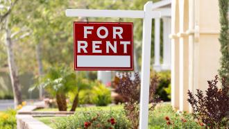 for rent sign on front lawn