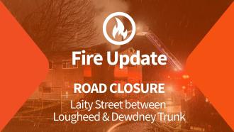 Fire Update. Road Closure Laity street between Lougheed and Dewdney Trunk. Fire icon overlaid image of apartment building with smoke. 