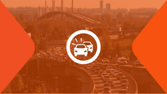 A white icon of two cars bumper to bumper sits on top of an orange-tinged photo of the Golden Ears Bridge and Golden Ears Way leading into Maple Ridge.