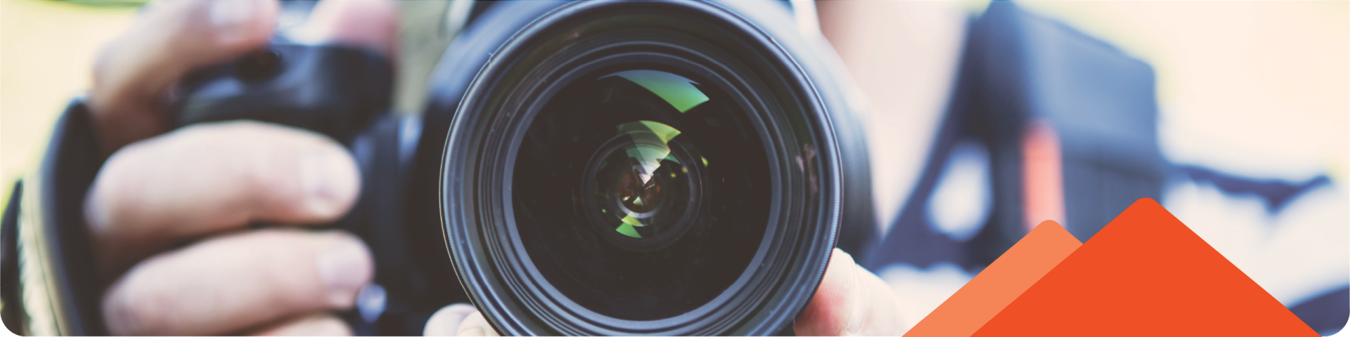 man holding video camera