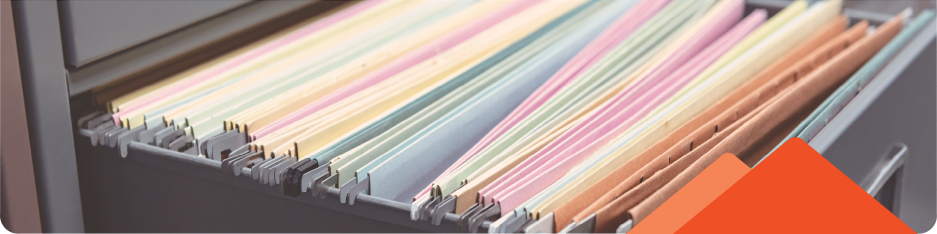 work desk full of colorful folders