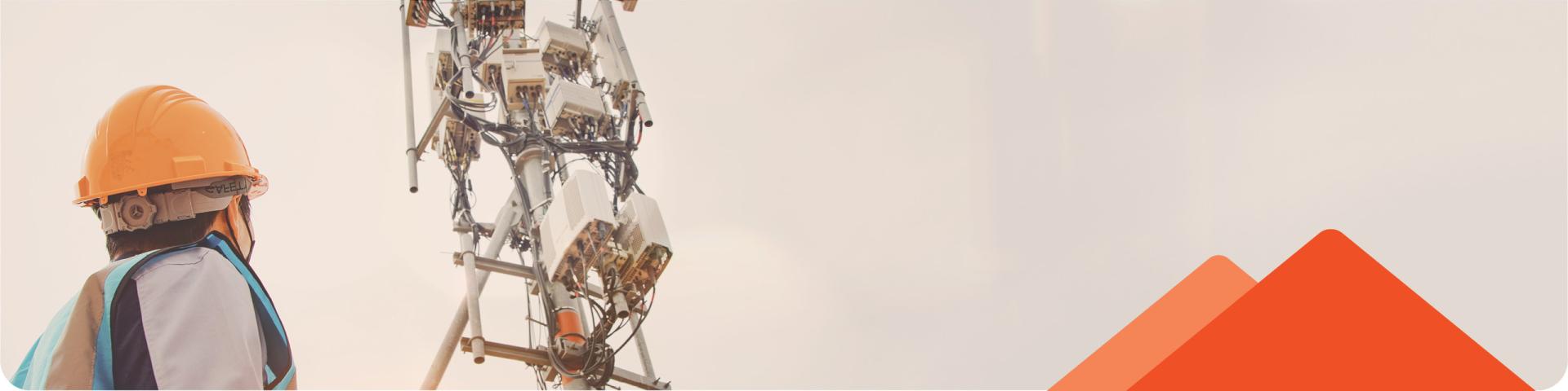 engineer safety helmet works in the field high rise building inspecting telecommunication tower structures 