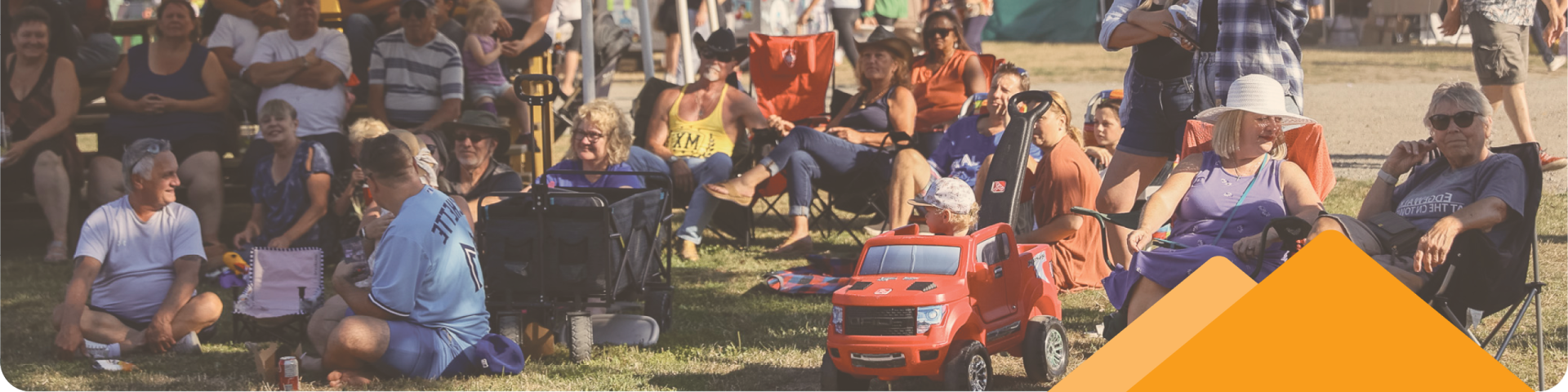 large crowd of people relaxing outside