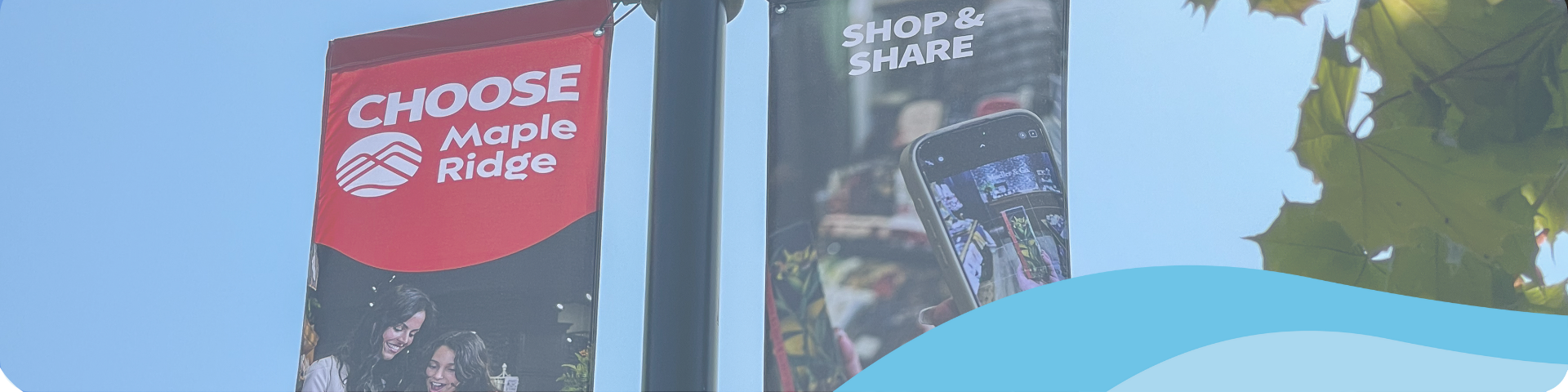 A graphical wave element sits in front of a pair of banners, one stating "Choose Maple Ridge" in white against a red background, and one showcasing a phone in use with the line "Shop and Share".