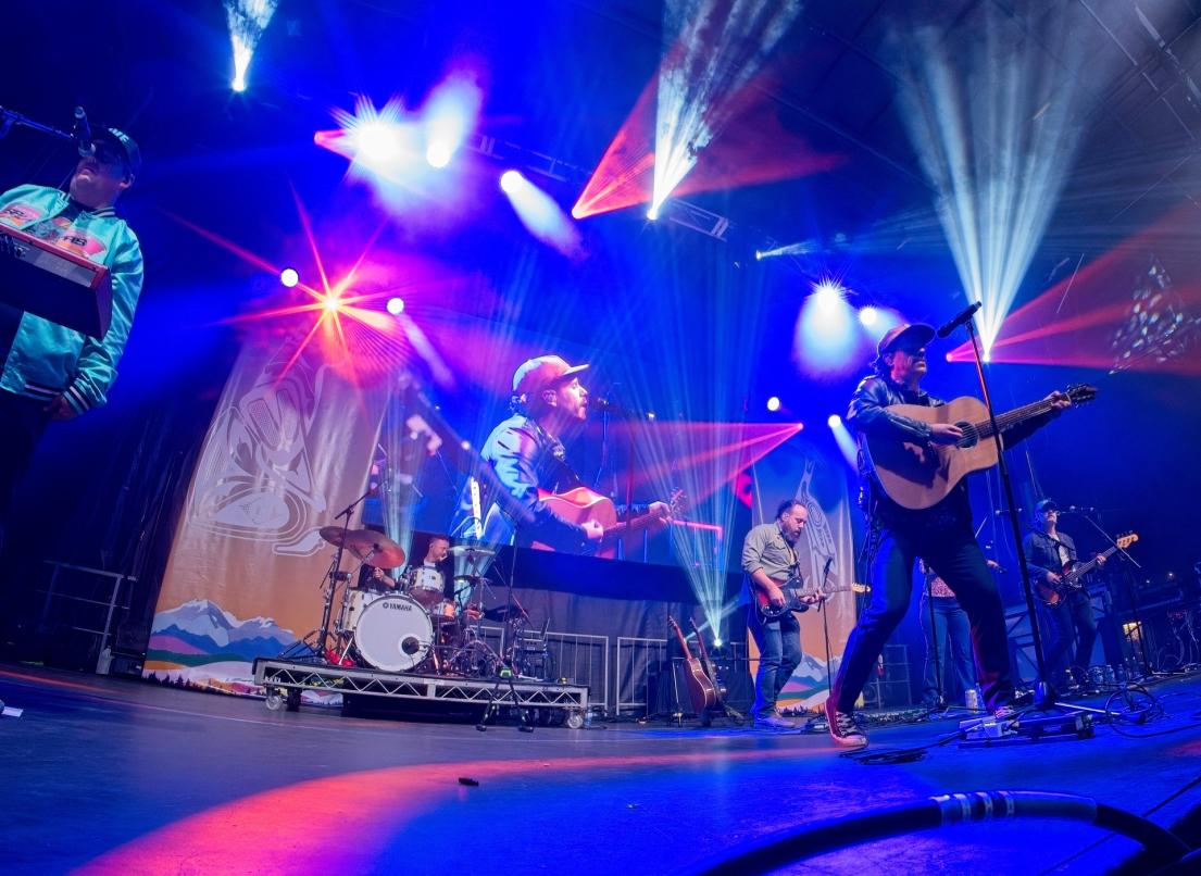 The Strumbellas give a lively nighttime performance during the 2024 Our Neck of the Woods celebration.