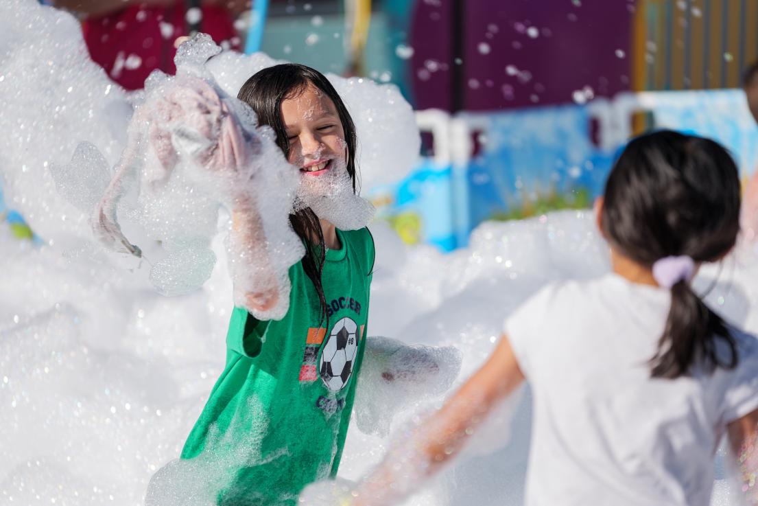 Young Girl in a Foam Pit at Rock the Block at Albion Community Centre