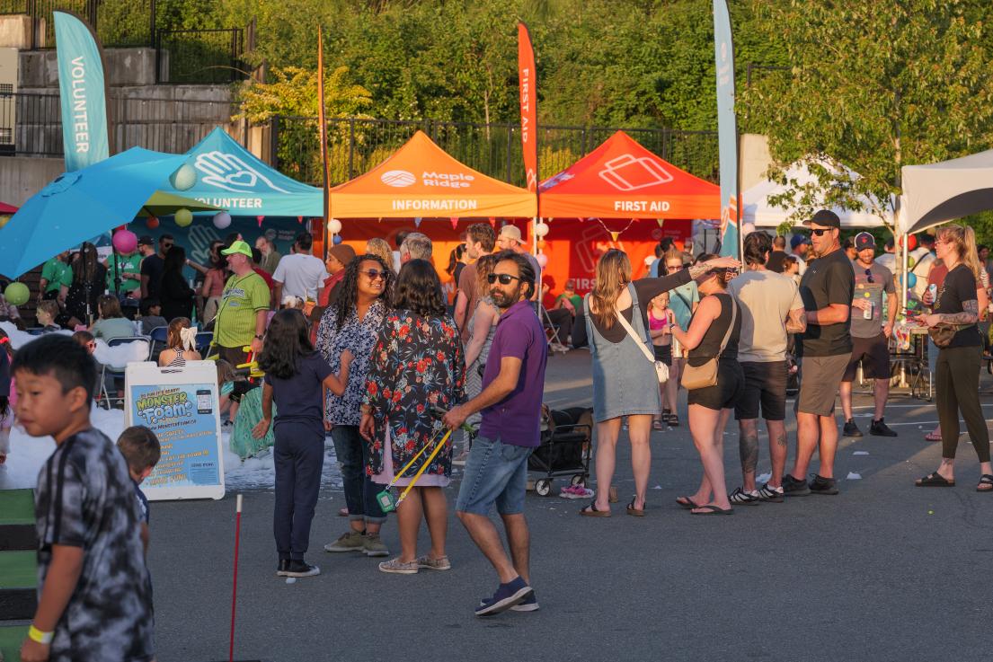 Group of People Outside Enjoying Rock the Block at Albion Community Centre