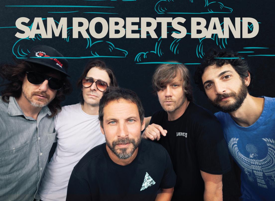 Sam Roberts Band crowds together.