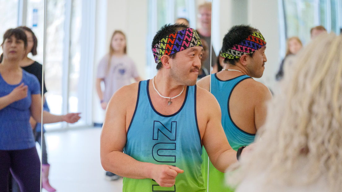 Quan teaching a Zumba class