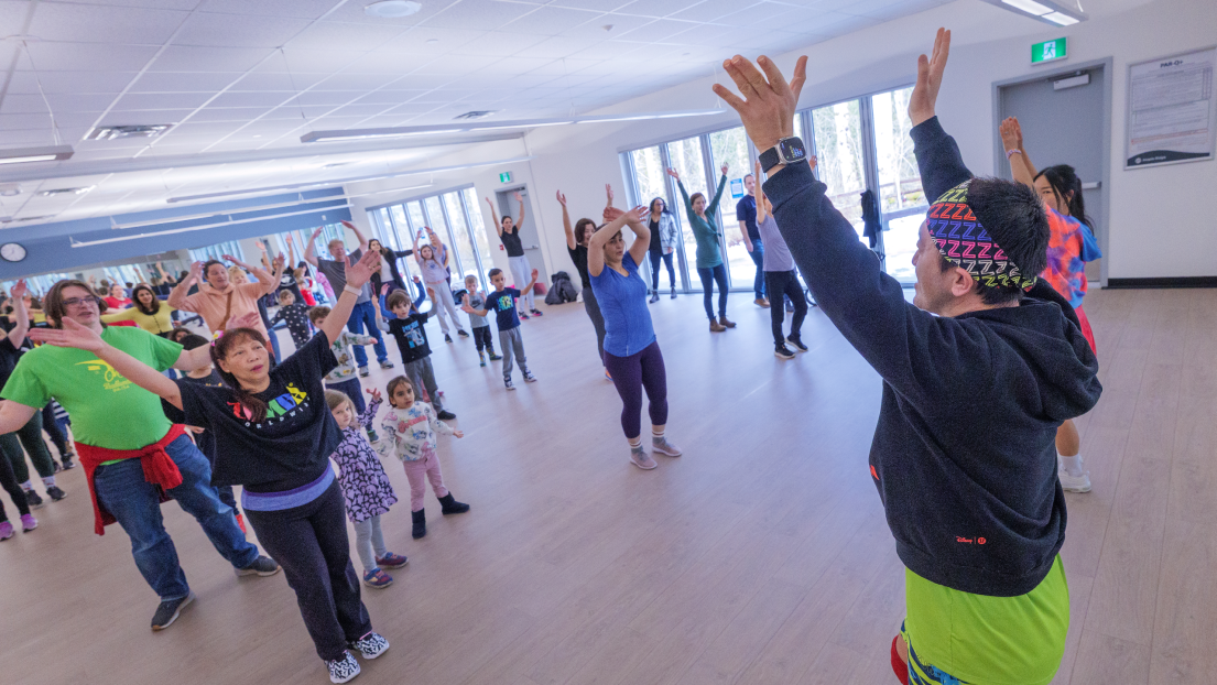 Quan teaching a Zumba class