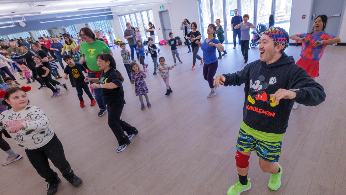 Quan teaching a Zumba class