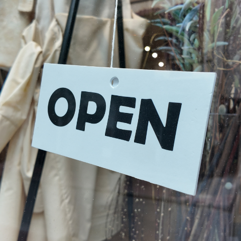 Open sign in the window of a business