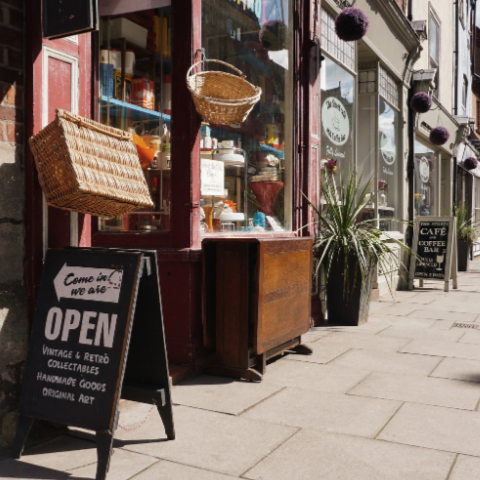 Shops on shopping street with inviting and enticing storefronts