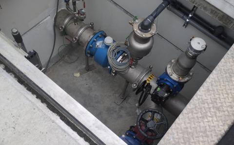 Pumps in a below-ground chamber