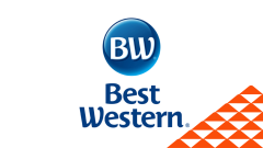 The Best Western logo next to a red soccer-ball patterned mountain.