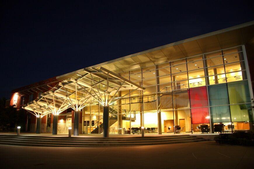 The ACT Theatre building illuminated at night