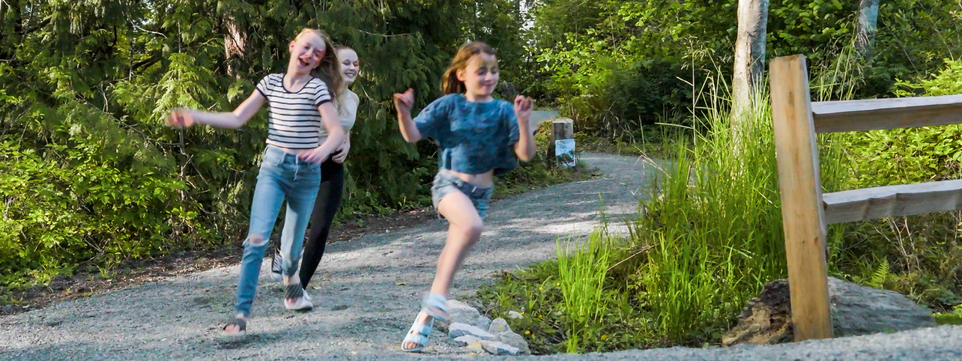 Children Running Down a Trail at Albion Community Centre