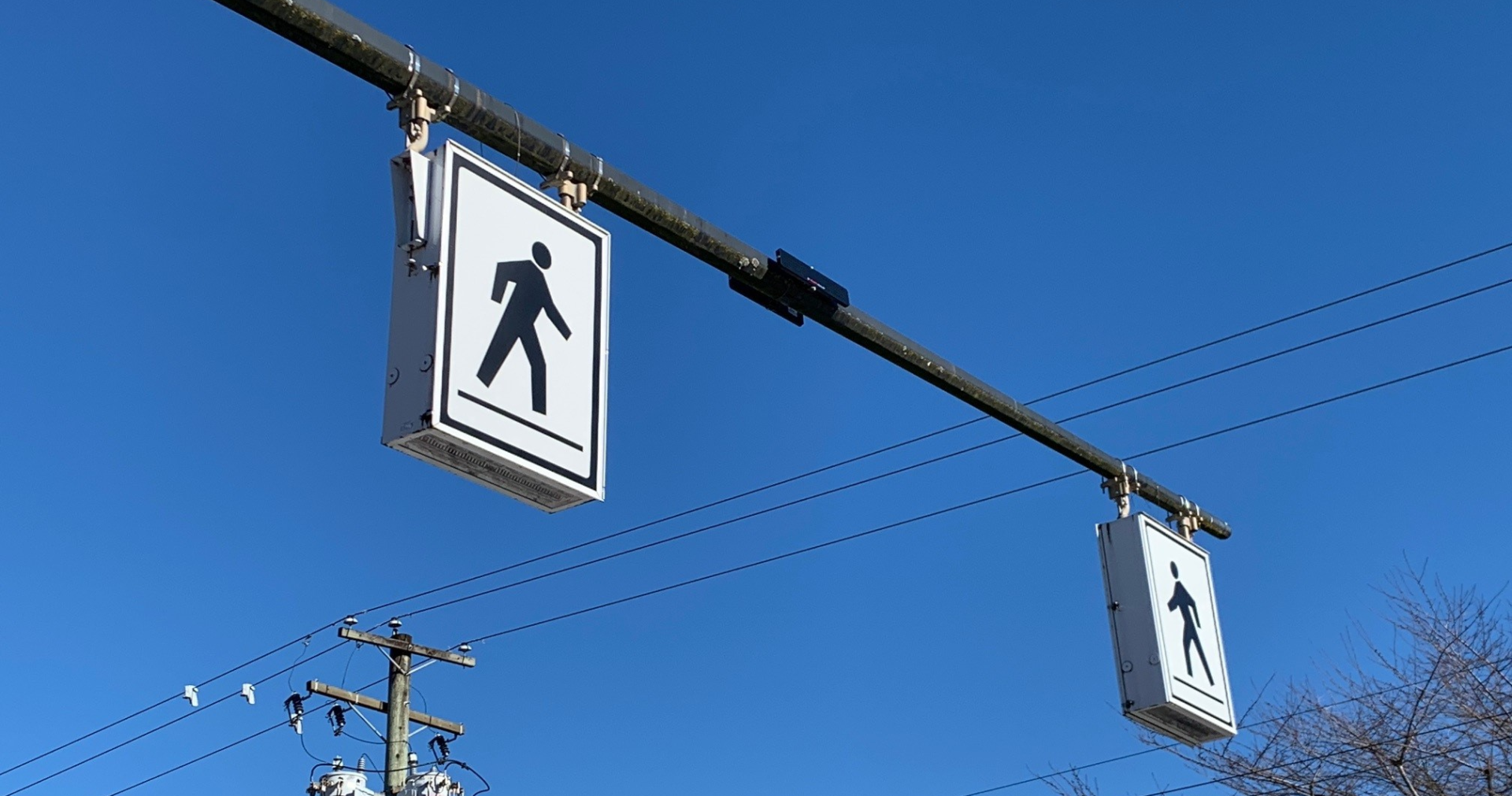 A pedestrian-activated overhead light