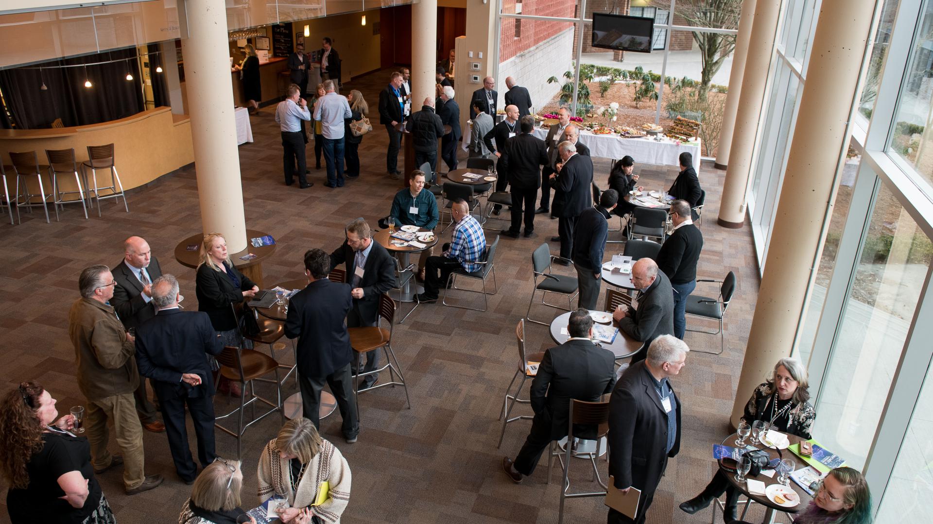 An overhead view of the ACT Arts Centre lobby just after an event as guests mingle.