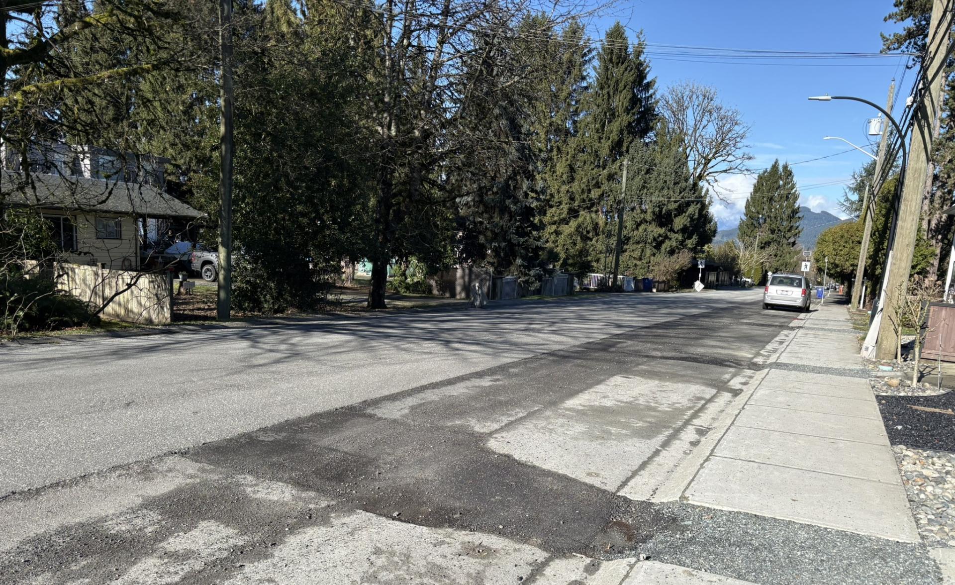 228 Street roadway showing pavement repairs