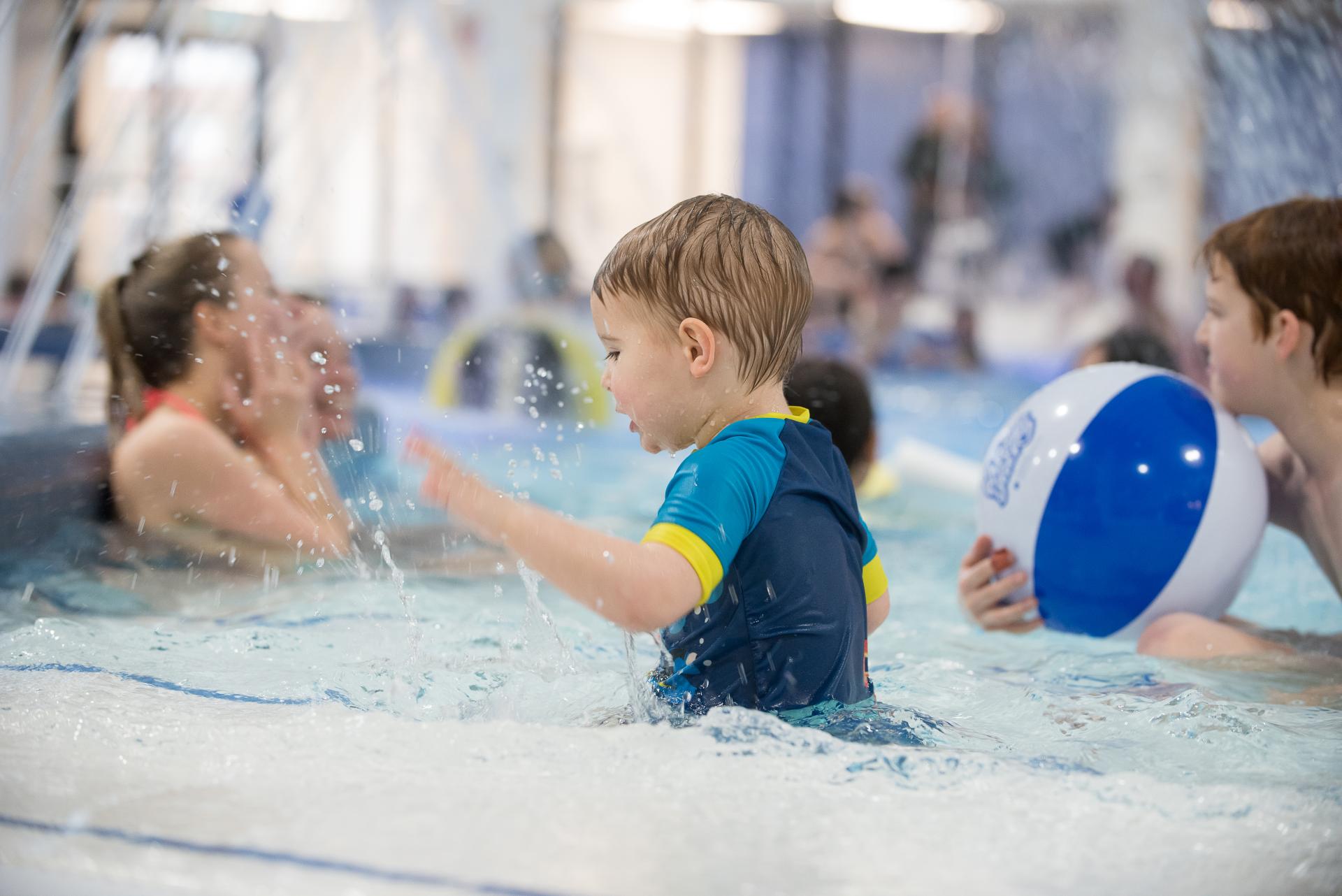 Little Boy Playing in the Leisure Pool